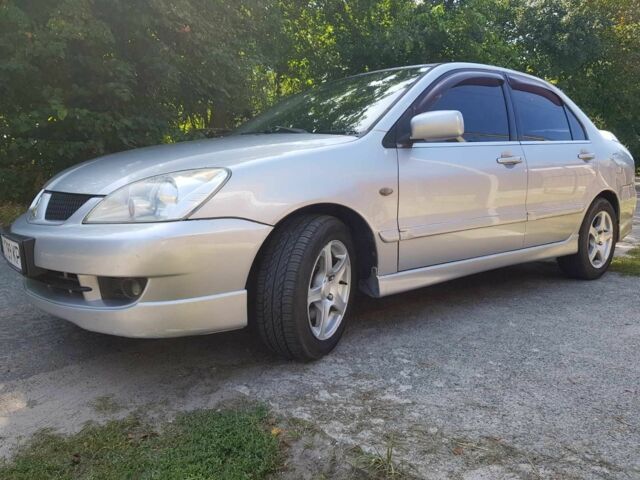 Сірий Міцубісі Lancer, об'ємом двигуна 1.6 л та пробігом 340 тис. км за 3250 $, фото 8 на Automoto.ua