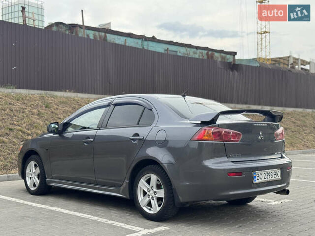 Сірий Міцубісі Lancer, об'ємом двигуна 2 л та пробігом 222 тис. км за 6300 $, фото 6 на Automoto.ua