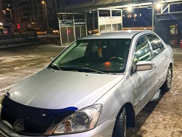 Сірий Міцубісі Lancer, об'ємом двигуна 1.6 л та пробігом 244 тис. км за 3900 $, фото 6 на Automoto.ua