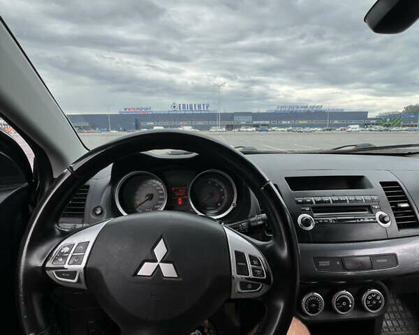 Сірий Міцубісі Lancer, об'ємом двигуна 2 л та пробігом 300 тис. км за 6299 $, фото 17 на Automoto.ua