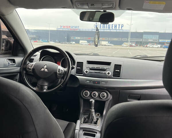 Сірий Міцубісі Lancer, об'ємом двигуна 2 л та пробігом 300 тис. км за 6299 $, фото 18 на Automoto.ua