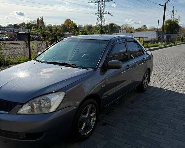Мицубиси Лансер 2007 в Днепре (Днепропетровске) на Automoto.ua Серый Мицубиси Лансер, объемом двигателя 1.6 л и пробегом 220 тыс. км за 3500 $, фото 4 на Automoto.ua