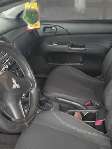 Серый Мицубиси Лансер, объемом двигателя 1.58 л и пробегом 400 тыс. км за 5000 $, фото 7 на Automoto.ua