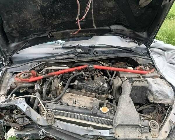 Мицубиси Лансер 2007 в Тернополе на Automoto.ua Серый Мицубиси Лансер, объемом двигателя 1.6 л и пробегом 350 тыс. км за 900 $, фото 11 на Automoto.ua