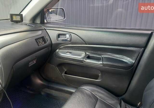 Сірий Міцубісі Lancer, об'ємом двигуна 1.6 л та пробігом 298 тис. км за 4100 $, фото 39 на Automoto.ua