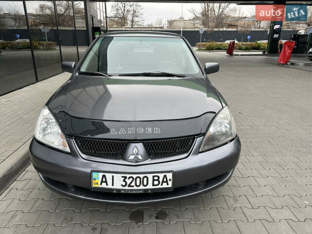 Сірий Міцубісі Lancer, об'ємом двигуна 1.6 л та пробігом 115 тис. км за 2800 $, фото 7 на Automoto.ua