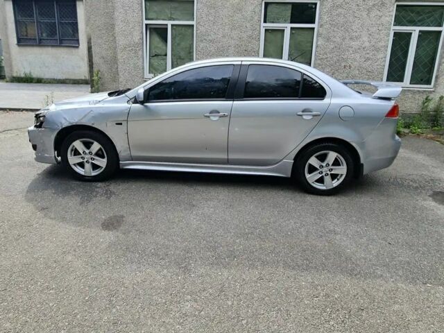 Сірий Міцубісі Lancer, об'ємом двигуна 2 л та пробігом 186 тис. км за 3750 $, фото 8 на Automoto.ua