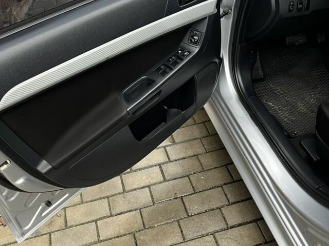 Серый Мицубиси Лансер, объемом двигателя 2 л и пробегом 227 тыс. км за 6600 $, фото 10 на Automoto.ua