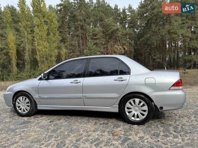 Серый Мицубиси Лансер, объемом двигателя 1.6 л и пробегом 200 тыс. км за 4400 $, фото 12 на Automoto.ua