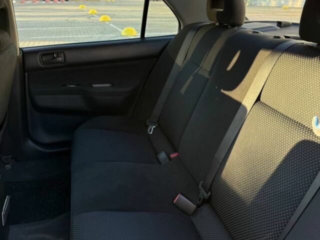 Сірий Міцубісі Lancer, об'ємом двигуна 1.6 л та пробігом 174 тис. км за 4800 $, фото 5 на Automoto.ua