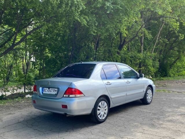 Сірий Міцубісі Lancer, об'ємом двигуна 0.16 л та пробігом 280 тис. км за 3900 $, фото 1 на Automoto.ua