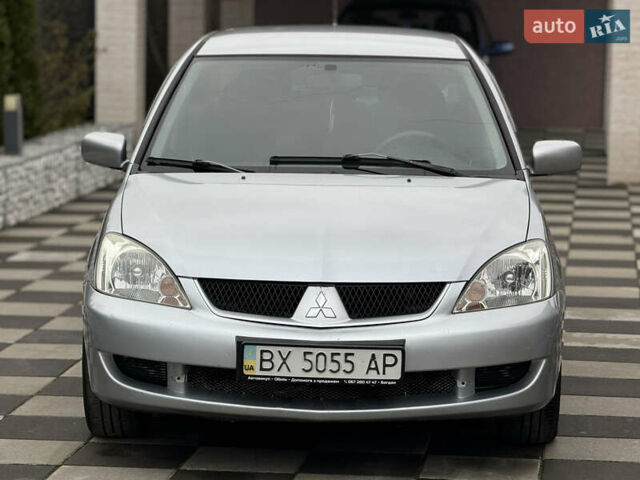 Сірий Міцубісі Lancer, об'ємом двигуна 1.6 л та пробігом 281 тис. км за 3999 $, фото 4 на Automoto.ua