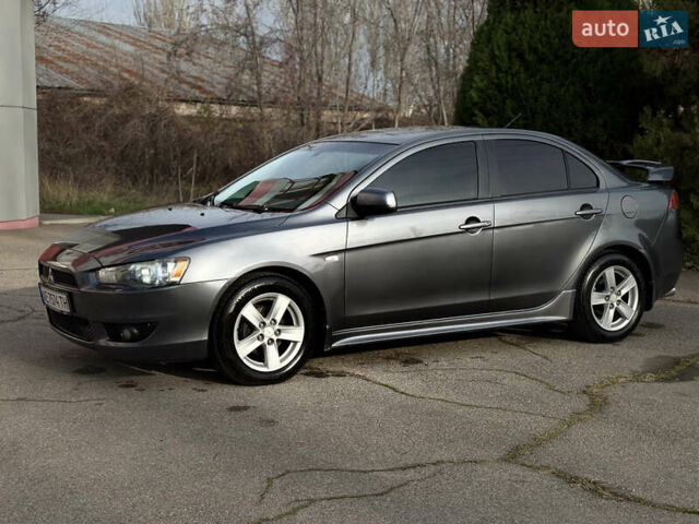 Сірий Міцубісі Lancer, об'ємом двигуна 2 л та пробігом 220 тис. км за 6800 $, фото 4 на Automoto.ua