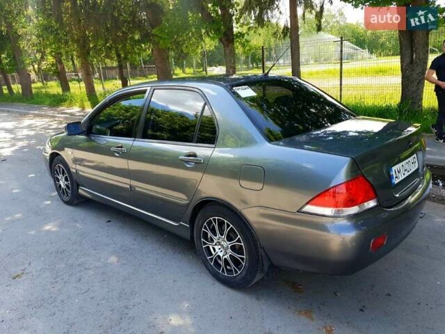 Сірий Міцубісі Lancer, об'ємом двигуна 1.58 л та пробігом 220 тис. км за 4500 $, фото 9 на Automoto.ua