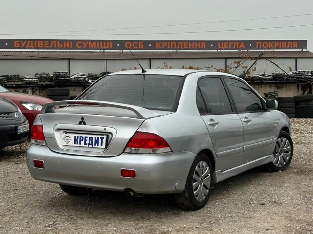 Серый Мицубиси Лансер, объемом двигателя 1.6 л и пробегом 280 тыс. км за 4600 $, фото 1 на Automoto.ua