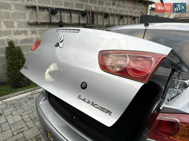 Міцубісі Lancer 2007 у Житомирі на Automoto.ua Сірий Міцубісі Lancer, об'ємом двигуна 1.5 л та пробігом 195 тис. км за 5700 $, фото 86 на Automoto.ua