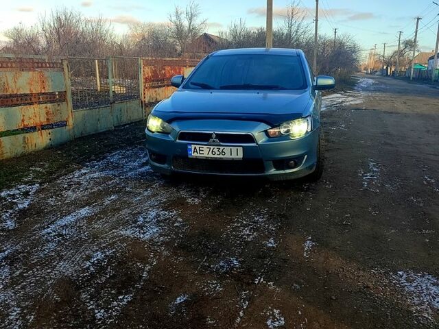 Серый Мицубиси Лансер, объемом двигателя 2 л и пробегом 225 тыс. км за 5500 $, фото 2 на Automoto.ua
