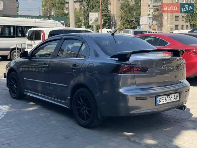 Сірий Міцубісі Lancer, об'ємом двигуна 2 л та пробігом 203 тис. км за 6999 $, фото 9 на Automoto.ua