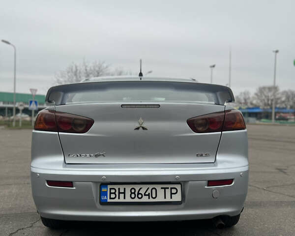 Серый Мицубиси Лансер, объемом двигателя 2 л и пробегом 286 тыс. км за 5800 $, фото 3 на Automoto.ua