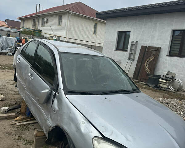 Сірий Міцубісі Lancer, об'ємом двигуна 1.58 л та пробігом 210 тис. км за 1300 $, фото 5 на Automoto.ua