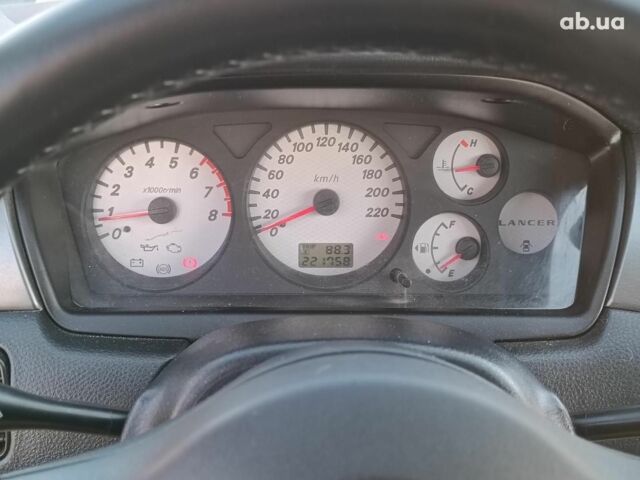 Сірий Міцубісі Lancer, об'ємом двигуна 1.6 л та пробігом 222 тис. км за 3990 $, фото 17 на Automoto.ua
