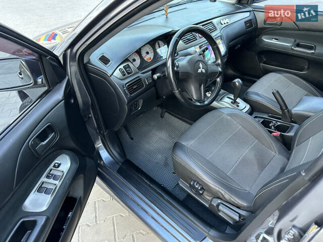 Сірий Міцубісі Lancer, об'ємом двигуна 1.6 л та пробігом 189 тис. км за 6200 $, фото 14 на Automoto.ua