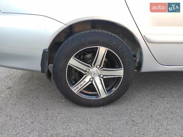 Серый Мицубиси Лансер, объемом двигателя 1.6 л и пробегом 187 тыс. км за 4500 $, фото 5 на Automoto.ua