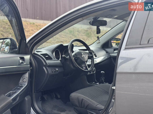 Сірий Міцубісі Lancer, об'ємом двигуна 2 л та пробігом 222 тис. км за 6300 $, фото 13 на Automoto.ua