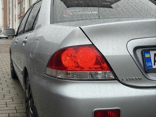 Сірий Міцубісі Lancer, об'ємом двигуна 1.6 л та пробігом 272 тис. км за 4500 $, фото 2 на Automoto.ua