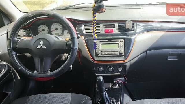 Сірий Міцубісі Lancer, об'ємом двигуна 1.6 л та пробігом 234 тис. км за 4500 $, фото 2 на Automoto.ua