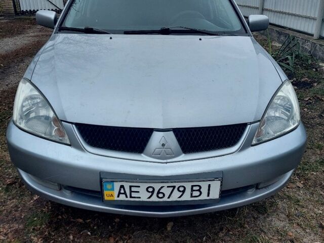 Серый Мицубиси Лансер, объемом двигателя 1.6 л и пробегом 220 тыс. км за 4000 $, фото 3 на Automoto.ua