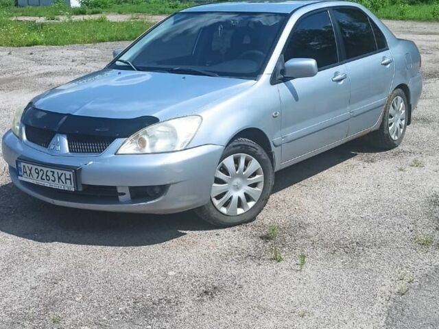 Сірий Міцубісі Lancer, об'ємом двигуна 1.6 л та пробігом 274 тис. км за 3200 $, фото 1 на Automoto.ua