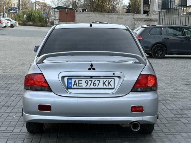 Сірий Міцубісі Lancer, об'ємом двигуна 1.6 л та пробігом 200 тис. км за 3900 $, фото 2 на Automoto.ua
