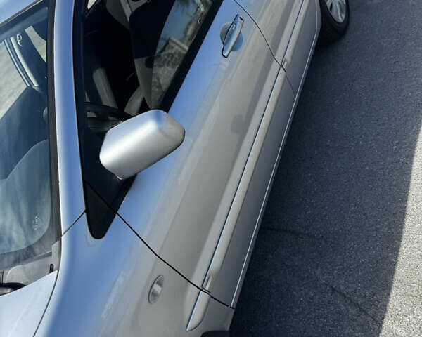 Серый Мицубиси Лансер, объемом двигателя 1.58 л и пробегом 261 тыс. км за 4500 $, фото 4 на Automoto.ua