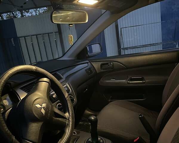 Сірий Міцубісі Lancer, об'ємом двигуна 1.6 л та пробігом 330 тис. км за 3500 $, фото 33 на Automoto.ua