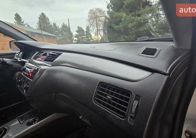 Сірий Міцубісі Lancer, об'ємом двигуна 1.6 л та пробігом 213 тис. км за 3600 $, фото 35 на Automoto.ua