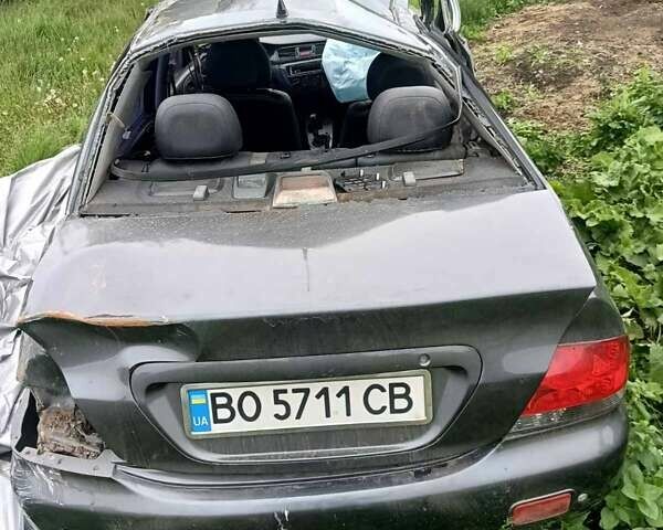 Мицубиси Лансер 2007 в Тернополе на Automoto.ua Серый Мицубиси Лансер, объемом двигателя 1.6 л и пробегом 350 тыс. км за 900 $, фото 12 на Automoto.ua