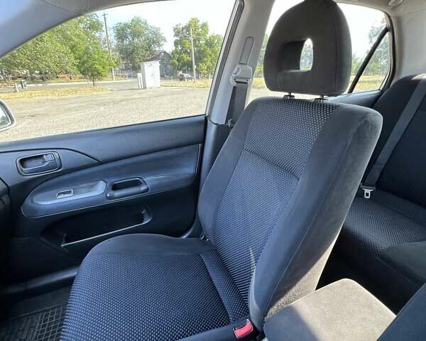Сірий Міцубісі Lancer, об'ємом двигуна 1.6 л та пробігом 283 тис. км за 4900 $, фото 12 на Automoto.ua