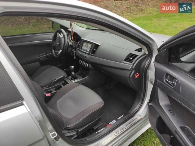 Сірий Міцубісі Lancer, об'ємом двигуна 2 л та пробігом 124 тис. км за 7499 $, фото 12 на Automoto.ua
