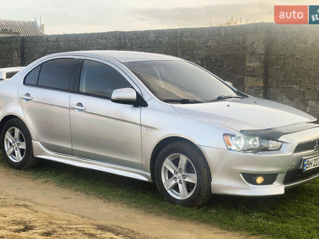 Серый Мицубиси Лансер, объемом двигателя 2 л и пробегом 226 тыс. км за 6200 $, фото 6 на Automoto.ua