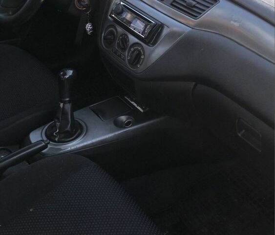 Серый Мицубиси Лансер, объемом двигателя 1.5 л и пробегом 269 тыс. км за 4200 $, фото 13 на Automoto.ua