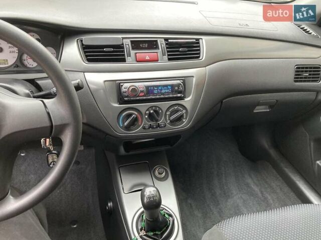 Сірий Міцубісі Lancer, об'ємом двигуна 1.59 л та пробігом 44 тис. км за 6200 $, фото 21 на Automoto.ua