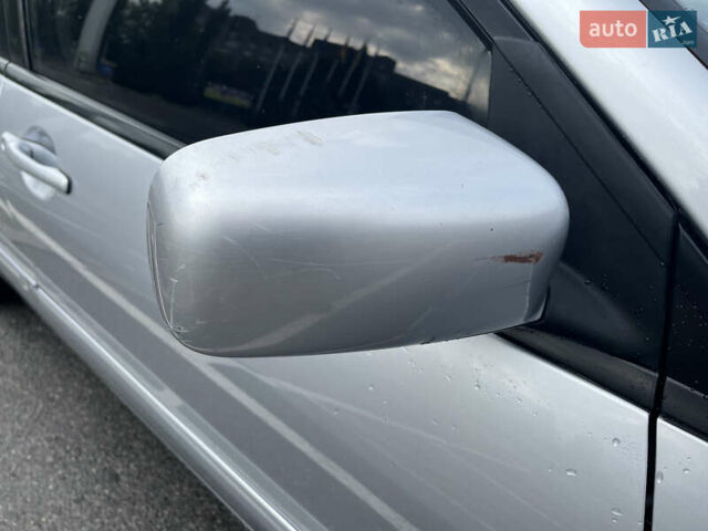 Серый Мицубиси Лансер, объемом двигателя 1.58 л и пробегом 232 тыс. км за 4900 $, фото 7 на Automoto.ua