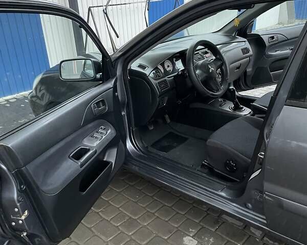 Сірий Міцубісі Lancer, об'ємом двигуна 1.6 л та пробігом 330 тис. км за 3500 $, фото 8 на Automoto.ua