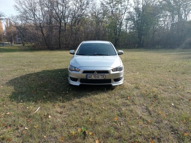 Серый Мицубиси Лансер, объемом двигателя 2 л и пробегом 180 тыс. км за 5800 $, фото 13 на Automoto.ua