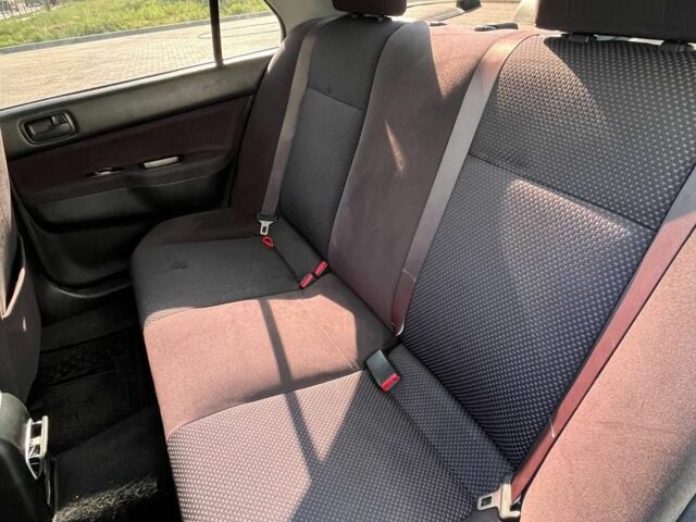 Серый Мицубиси Лансер, объемом двигателя 1.6 л и пробегом 161 тыс. км за 4800 $, фото 3 на Automoto.ua