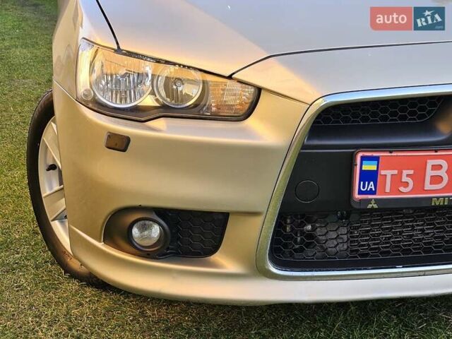 Серый Мицубиси Лансер, объемом двигателя 2 л и пробегом 282 тыс. км за 5450 $, фото 24 на Automoto.ua