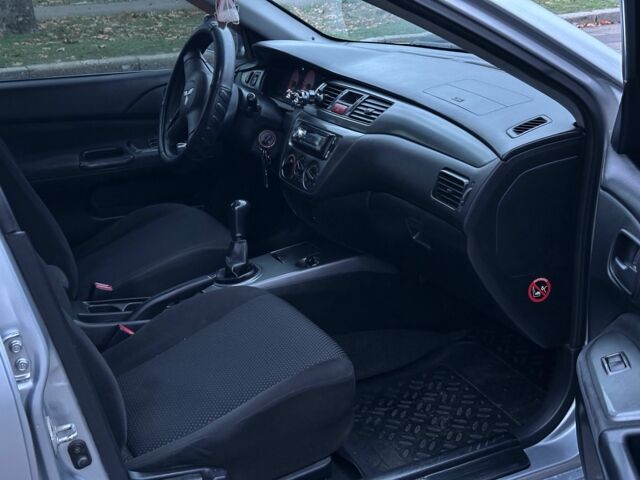 Сірий Міцубісі Lancer, об'ємом двигуна 1.6 л та пробігом 210 тис. км за 4750 $, фото 7 на Automoto.ua