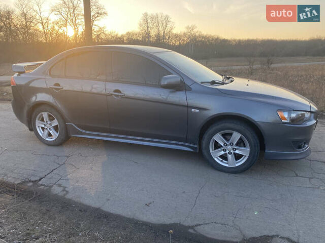 Сірий Міцубісі Lancer, об'ємом двигуна 2 л та пробігом 205 тис. км за 7000 $, фото 8 на Automoto.ua