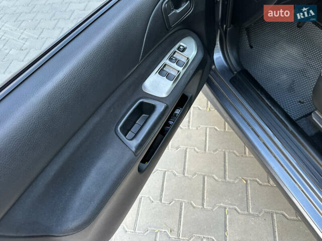 Сірий Міцубісі Lancer, об'ємом двигуна 1.6 л та пробігом 189 тис. км за 6200 $, фото 15 на Automoto.ua